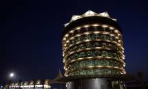Bahrain International Circuit's tower at night.