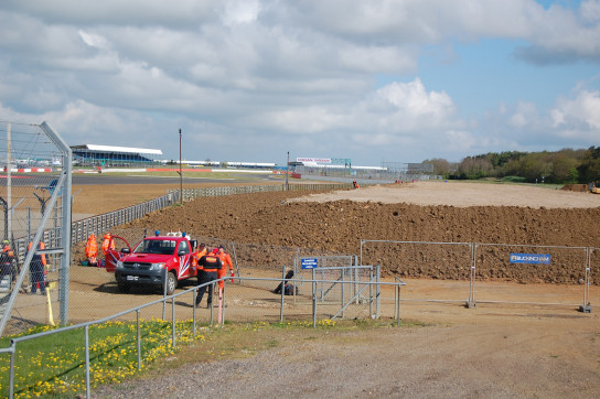 Spectator mounds under construction.